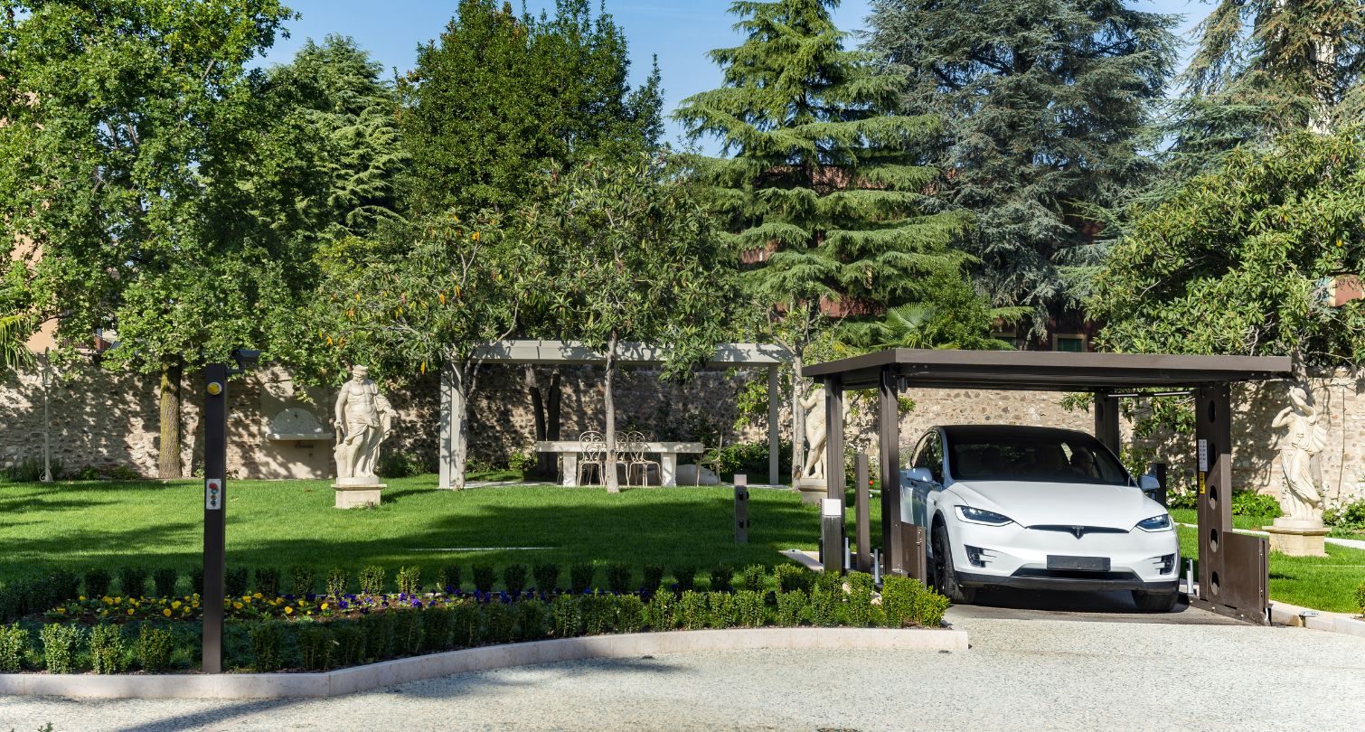 car driving out of the raised car lift
